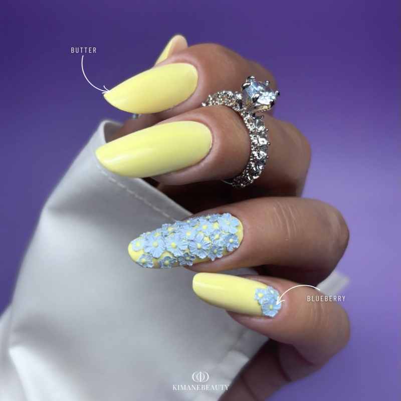 ongles en gel amande jaune pastel et fleur en relief