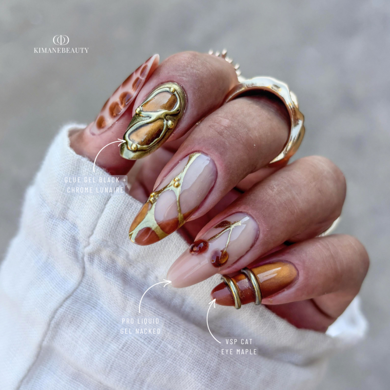 Pose d'ongles en amandes avec le vernis semi permanent Cat Eye Maple, ambré doré miel