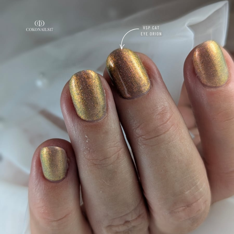 Pose d'ongle ovale avec le vernis semi permanent Orion, doré cuivré rosé