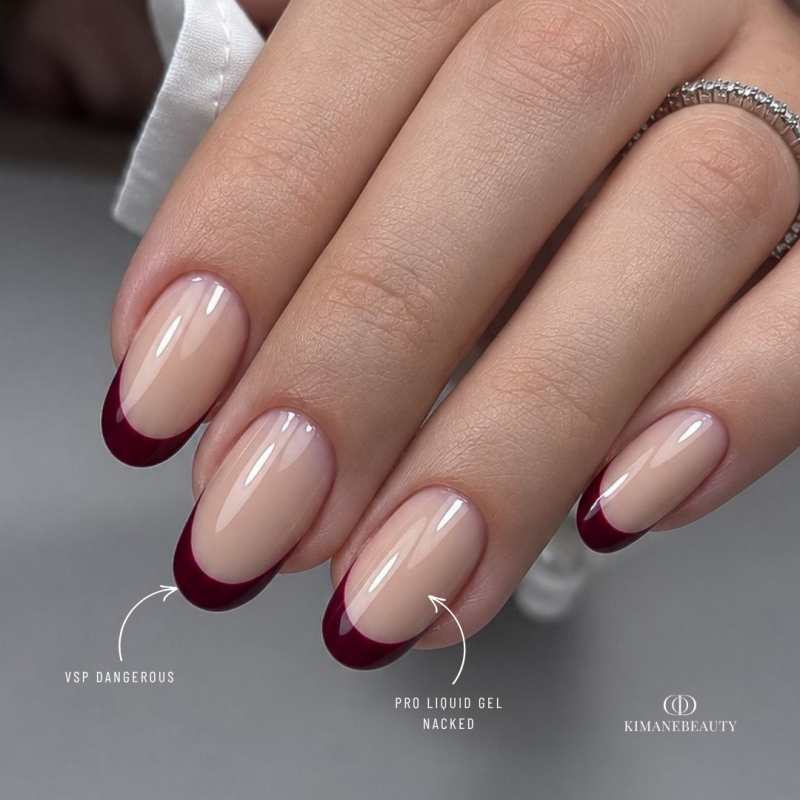 Pose d'ongles en amandes avec le vernis semi permanent Dangerous, bordeaux cerise noire