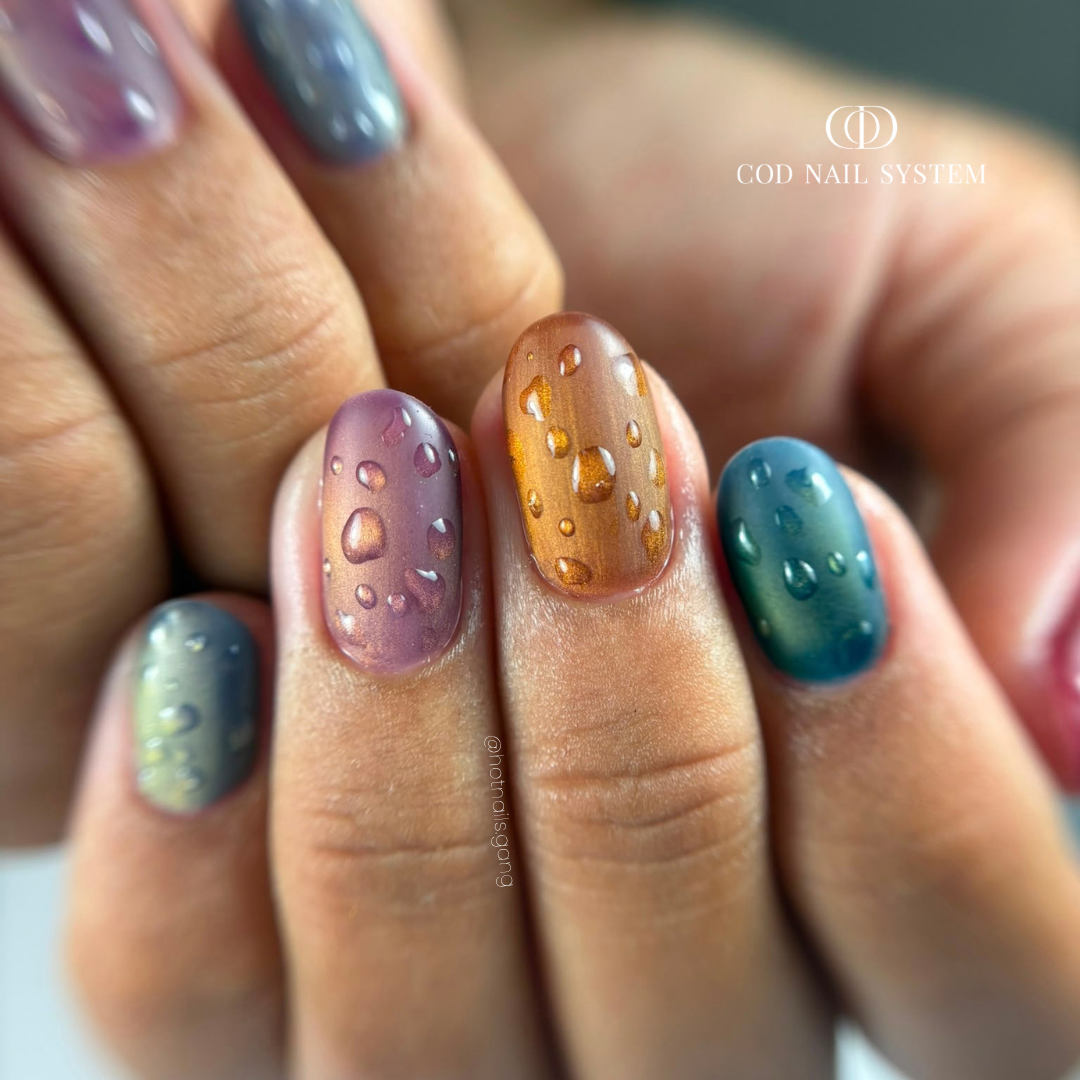 Pose d'ongles ovale cat eye soie avec finition matt velours