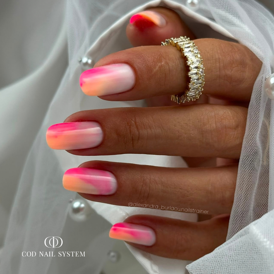 Pose d'ongles en amandes avec une finition milky rose