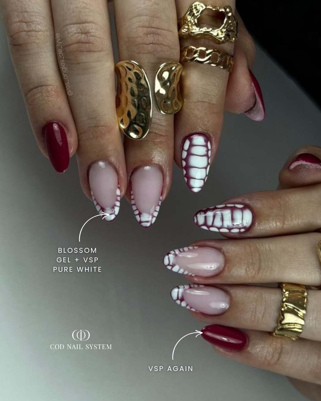 Ongles bordeaux avec blooming blanc Pose d'ongles en amandes bordeaux avec nail art blooming blanc