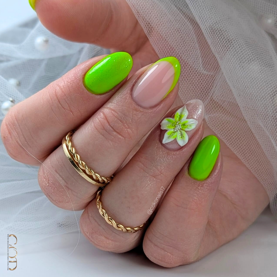 Pose d'ongles ovale vert néon avec fleurs 3D