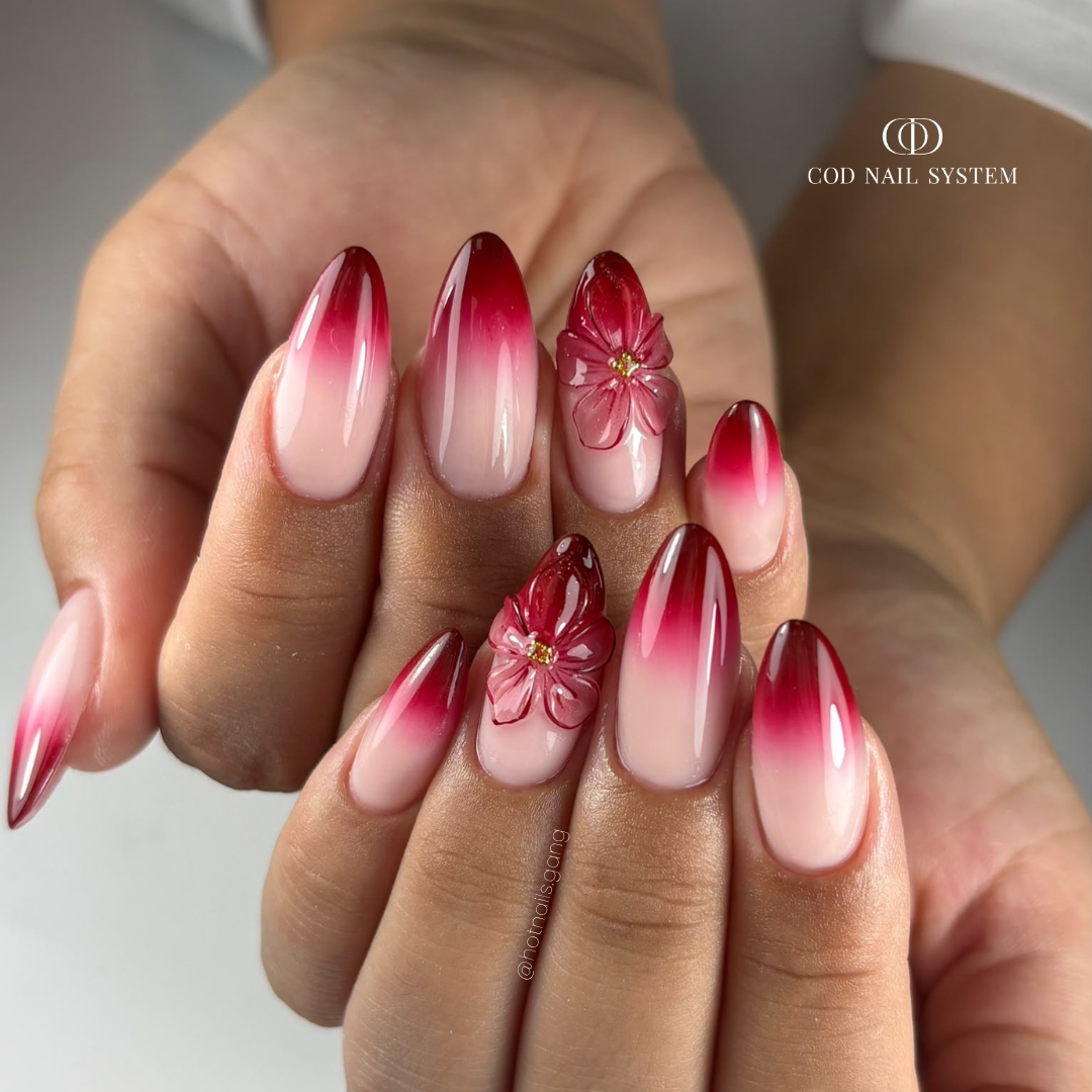 Pose d'ongles amandes bordeaux 3D Pose d'ongles en amandes avec babycolor bordeaux et fleurs 3D